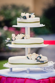 wedding cake in white, floral decorated with marzipan