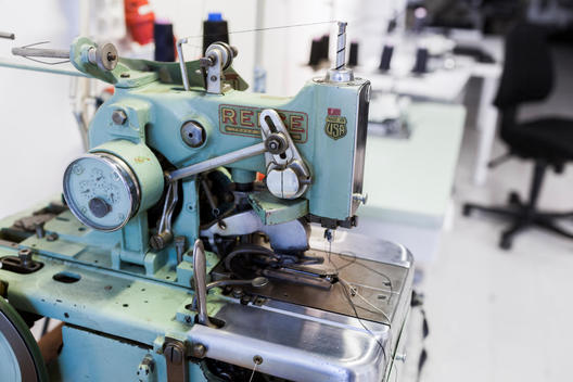 Sewing machine in jeans factory