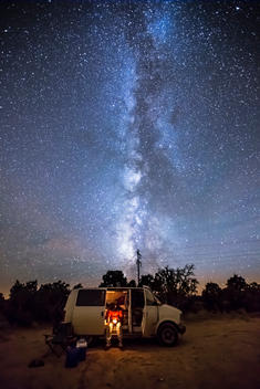 A Person Sitting In A Van Car Camping Under The Night Sky And Aurora Borealis Stock Images Page Everypixel