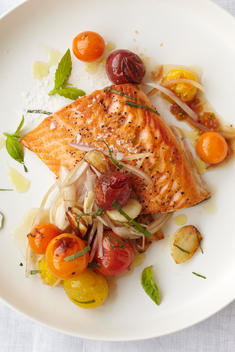A Salmon Dish With Cherry Tomatoes