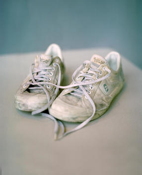 Old And Worn Out Running Shoes