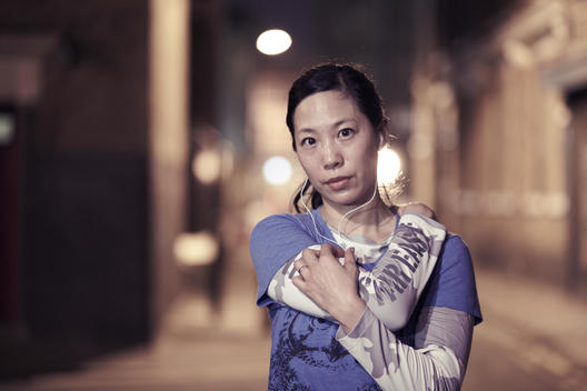 Chinese girl in street post-run
