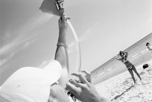 Panama City, Florida USA March 2004 Young Americans party in Florida for spring break 2004. Funneling … is when a drinker uses a funnel attached to a tube to drink a beer or two or three in one swallow. It is a common beach practice during spring break so
