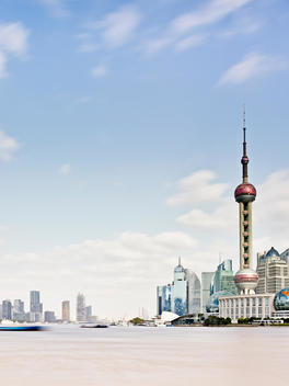Pudong skyline and the Bund on river Huangpu, Shanghai, China