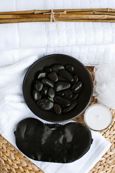 Hot stone therapy and eye mask