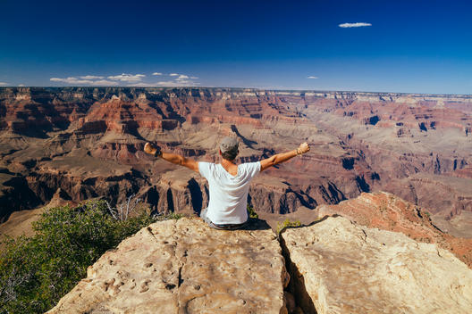 USA, Arizona, man enjoying the view at Grand Canyon, back view