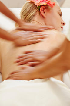 Woman having massage in spa