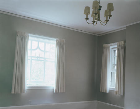 Two Windows With 1970\'S Ceiling Fixture, Light Drifting Into Room