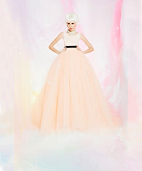 Picture in pastel colors from professional photo shoot with girl in designer fashion