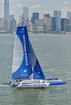 Armel Le Cl?ac\'h and the Maxi Trimaran Solo Banque Populaire VII on stand by for the multihull North Atlantic solo record attempt, New York, Manhattan, United States of America.