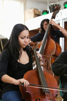 Students practicing in high school orchestra