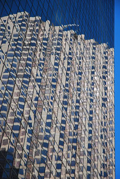 Reflection of buildings on the glass of building, Houston business district, Texas, USA.