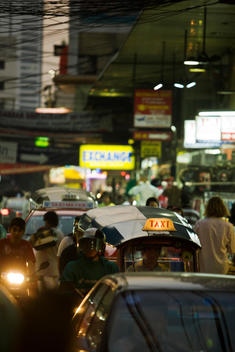 Street level shot of an asian taxi