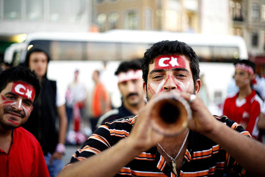 Variety Daily Life Scenes From Istanbul Streets In Turkey, Local Musicians Play Music And Wearing Turkish Flag Paintings On Their Forehead As Well Enjoying Before The Football Game Between Turkey And Germany, Taksim On June, 2008