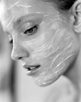 Beauty Model With Skin Cream Mask On Face