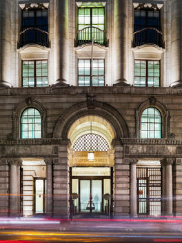 Night shot of entrance to luxury office on Lombard Street, designed by Pringle Richards Sharratt Architects, London, UK.