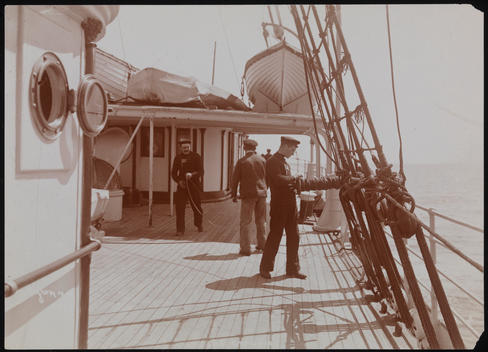 Crew Members Working On A Deck Of The S.S. \