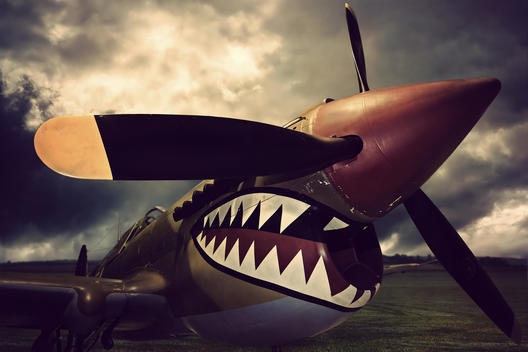 Close up of World War II plane with shark teeth paint