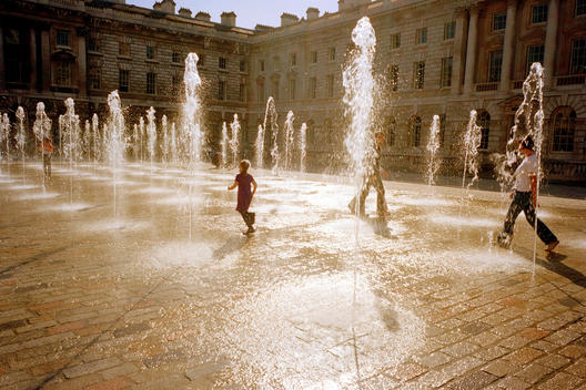 Child Running Through Water Fountains At Somerset House