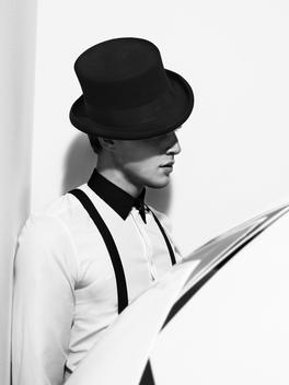 A Male Model With A Black Hat