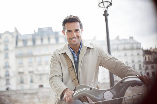 Businessman on bicycle, Paris, France