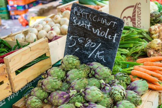 Fresh vegetables for sale in farmer's market on Place aux Herbes in Uz?s