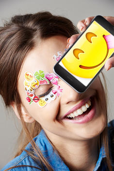 Female model with Emoji stickers