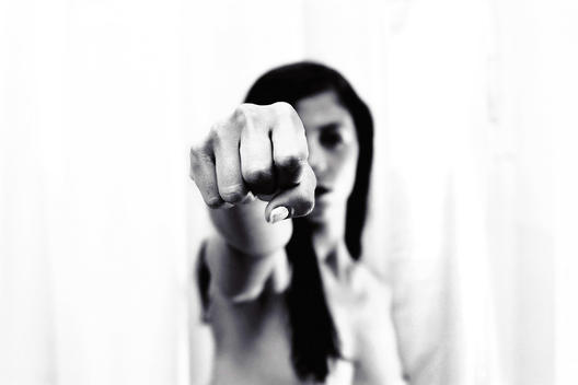 A woman punching the air with her fist