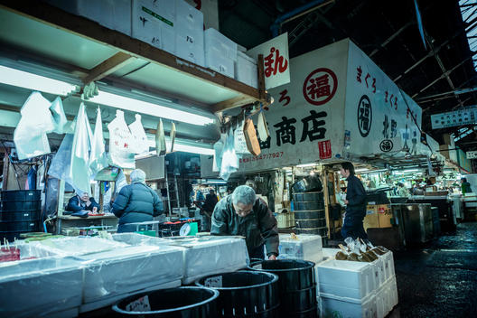 Fish sales people in Tsukiji Fish Market in Tokyo