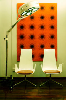 Designer Chairs And Surgery Lamp.