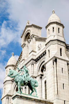 A statue on top of the Basilica Sacr?-Coeur, formally known as Basilica of the Sacred Heart of Paris, on top of Montmartre in Paris, France.