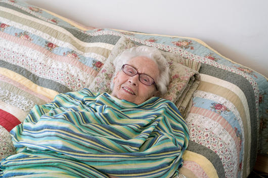 Old Woman In Bed