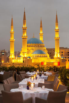 A restaurant terrace at Le Grays hotel overlooking Mohammad Al-Amin Mosque at Martyrs Square in Beirut, Lebanon