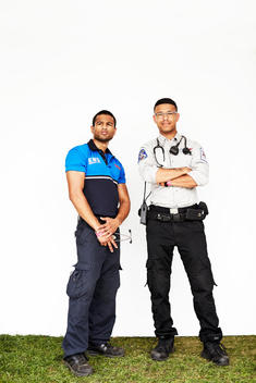 A portrait of two emergency medical workers at an electronic music festival in New York