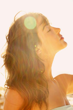 Profile of Young Woman in Sunlight