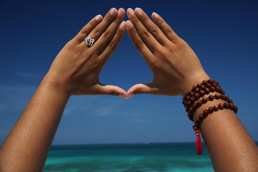 Close up of hands making triangle, Paradise Island, Nassau, Bahamas