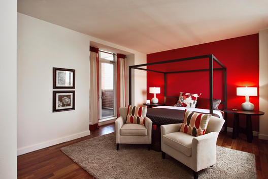 Red Master Bedroom With Doors To Terrace, Four-Post Bed And Shag Rug