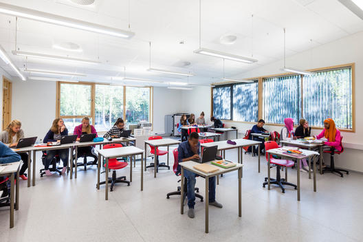 Children in a classroom at Aamot School designed by L2 Arkitekter, Aamot, Norway.