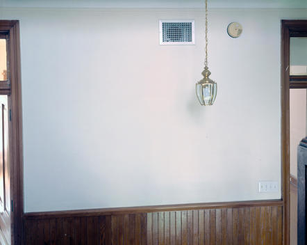 White Wall With Wood Paneling, Victorian Fixture, Off-Kilter Symmetry
