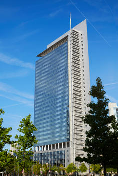 Pollux\' tower in Frankfurt against blue skies. Built between 1994-99 architect Kohn, Pedersen & Fox