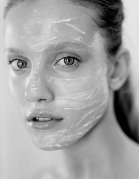 Beauty Model With Skin Cream Face Mask