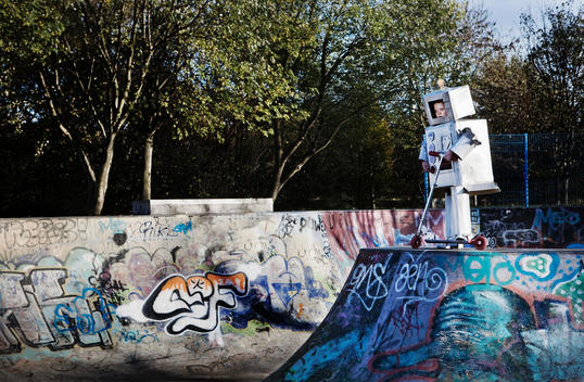 Boy Dressed As Robot In Skate Park