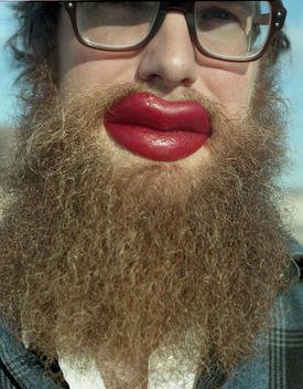 Portrait Of Hipster Man With Fake Lips