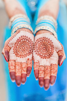 Shallow depth of field showcasing the Indian bridal henna