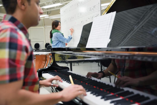 Students working in music room at college campus