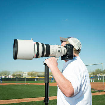 TOPPS photographer Ed photographing baseball card portraits during Spring Training, Surprise Stadium AZ