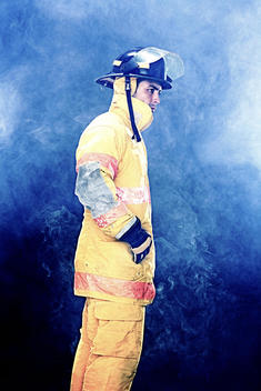 Portrait Of Firefighter In Smoke