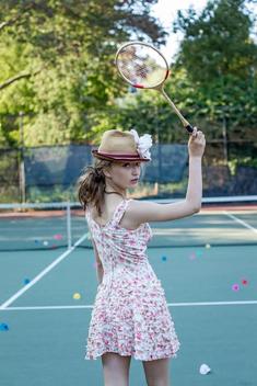 portrait of girl with badminton racquet