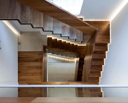 Looking down on the internal staircase, Daleham Gardens, London. Wood stairs and flooring.
