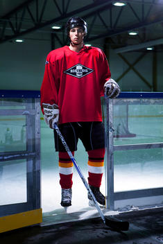 Junior Ice Hockey Player In Rink